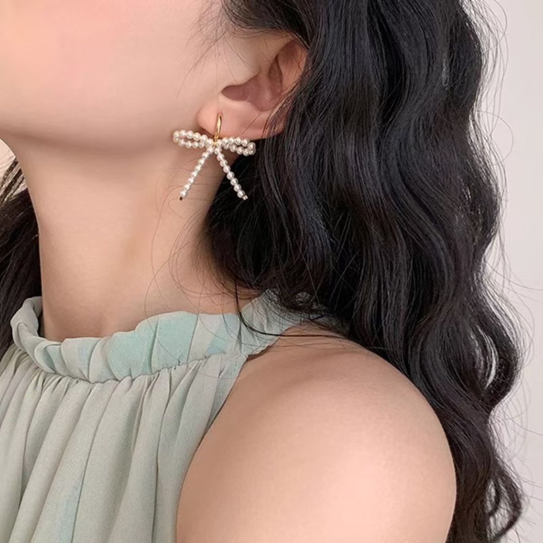 Graceful Bow Pearl Dangles Earrings