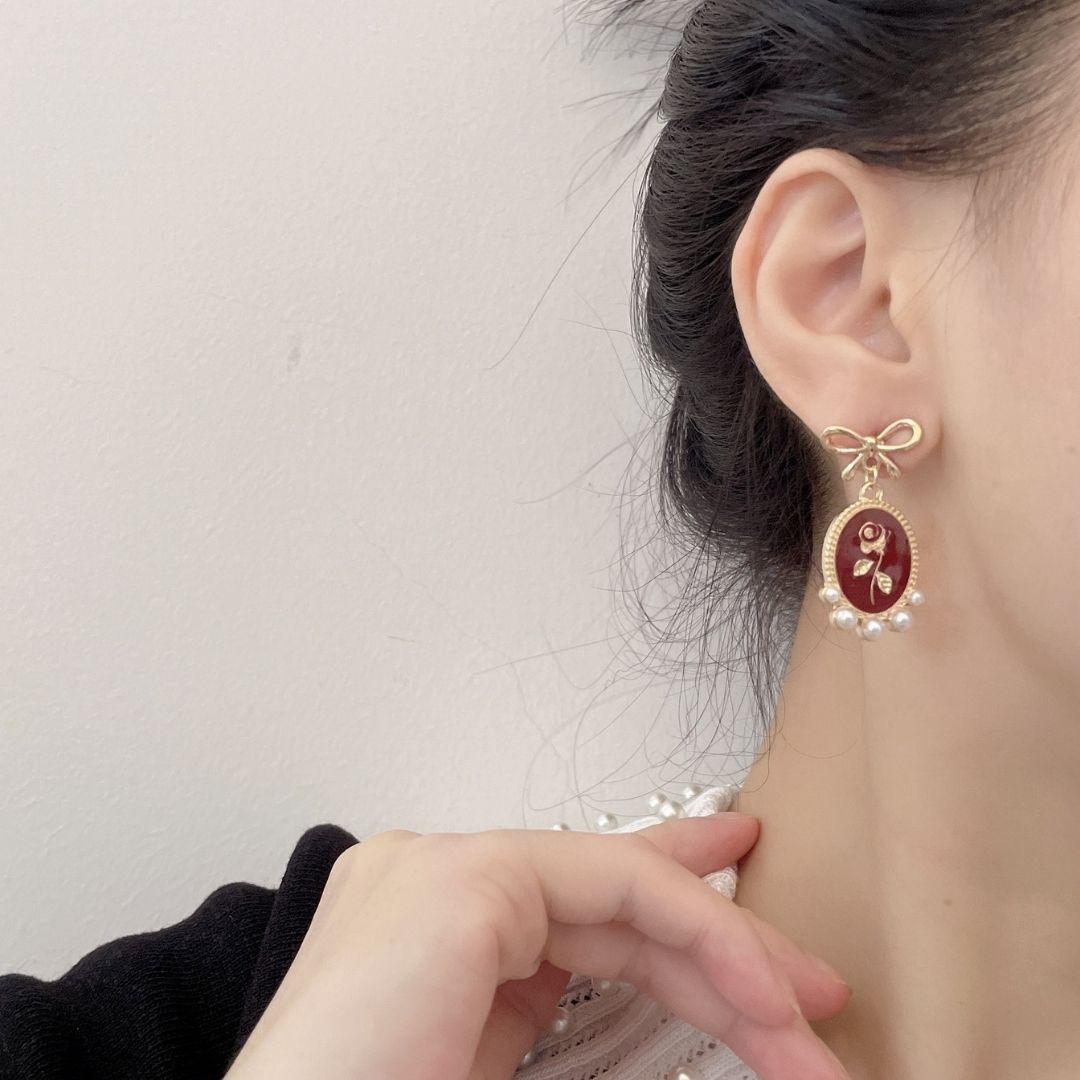 Gilded Garnet Cameos Earrings