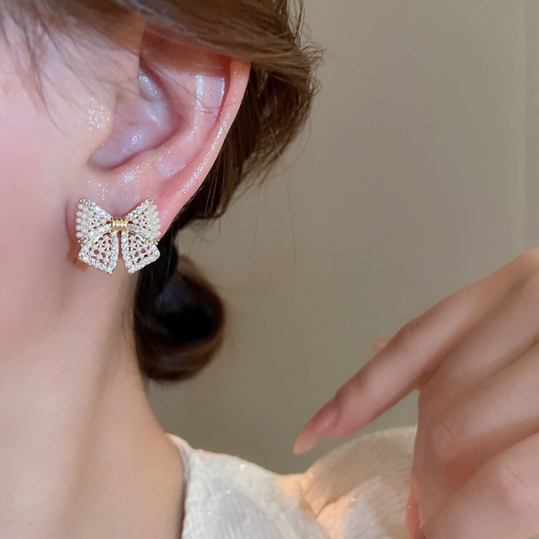 Gilded Pearl Bow Studs Earrings