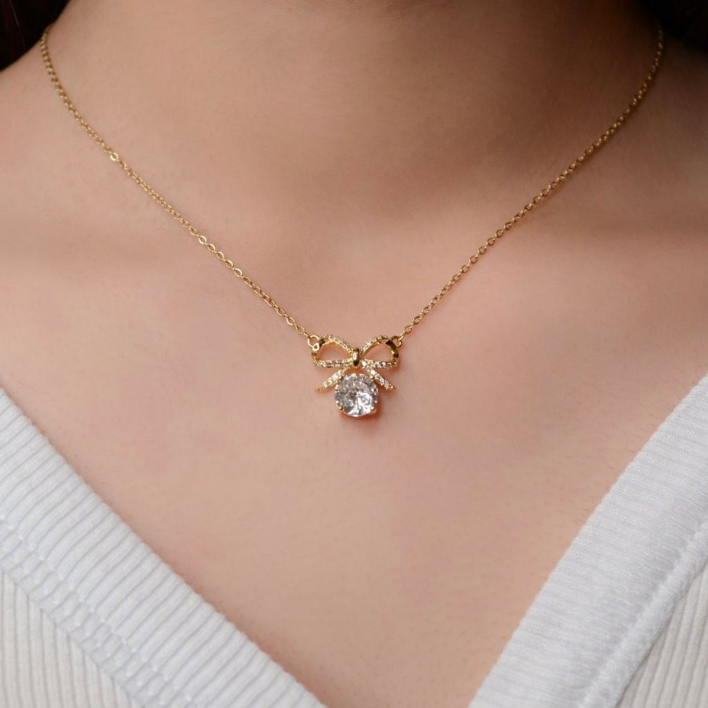 Glimmer Bow Necklace