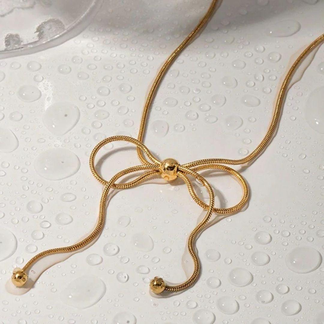 At The 11th Hour bow Neckpiece