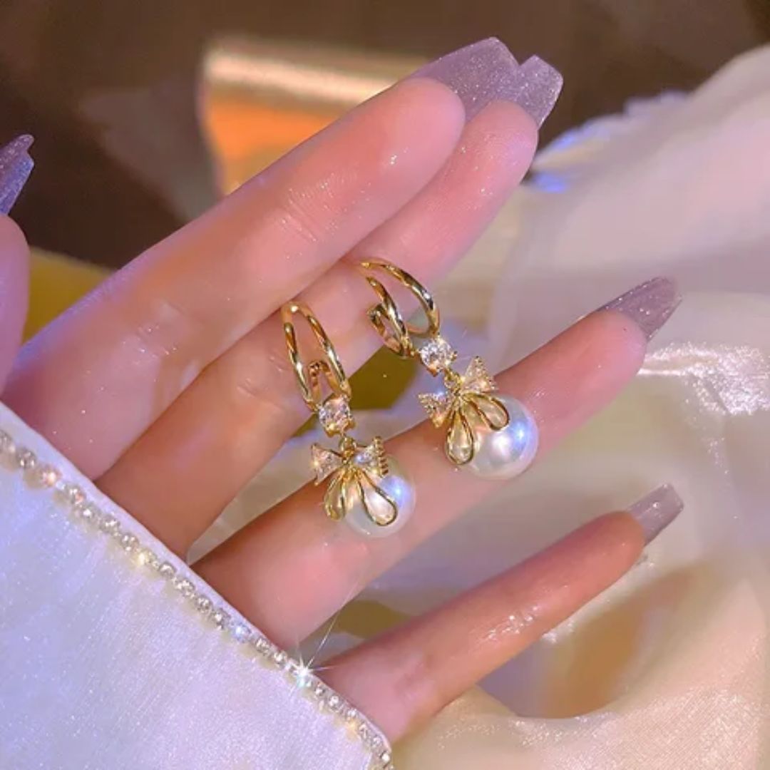 Perky Pearl Bow Stud Earrings