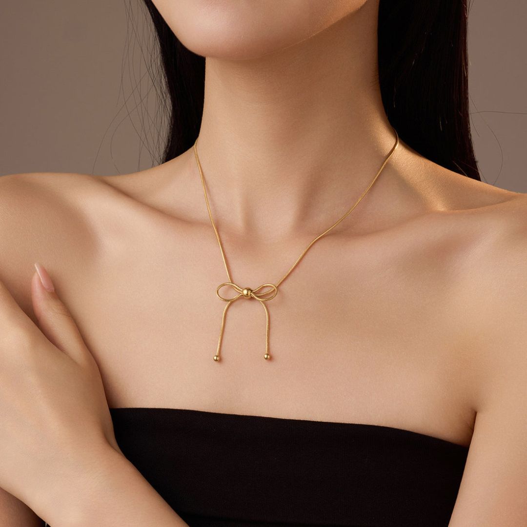 At The 11th Hour bow Neckpiece