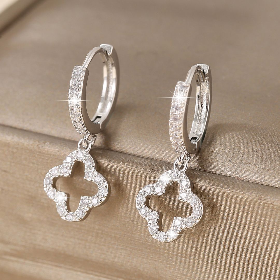 Radiant Twist Silver Earrings