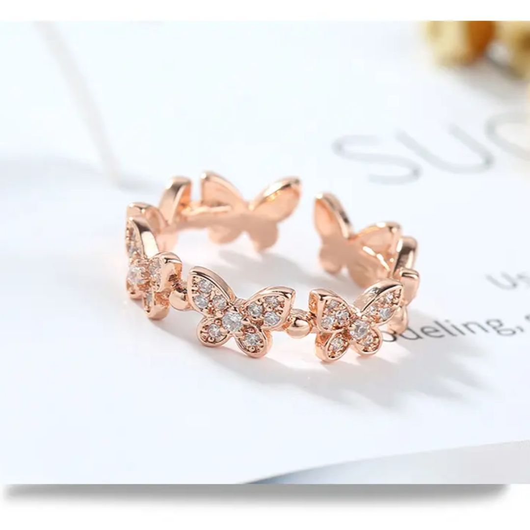 Eterna Swirl butterfly ring.