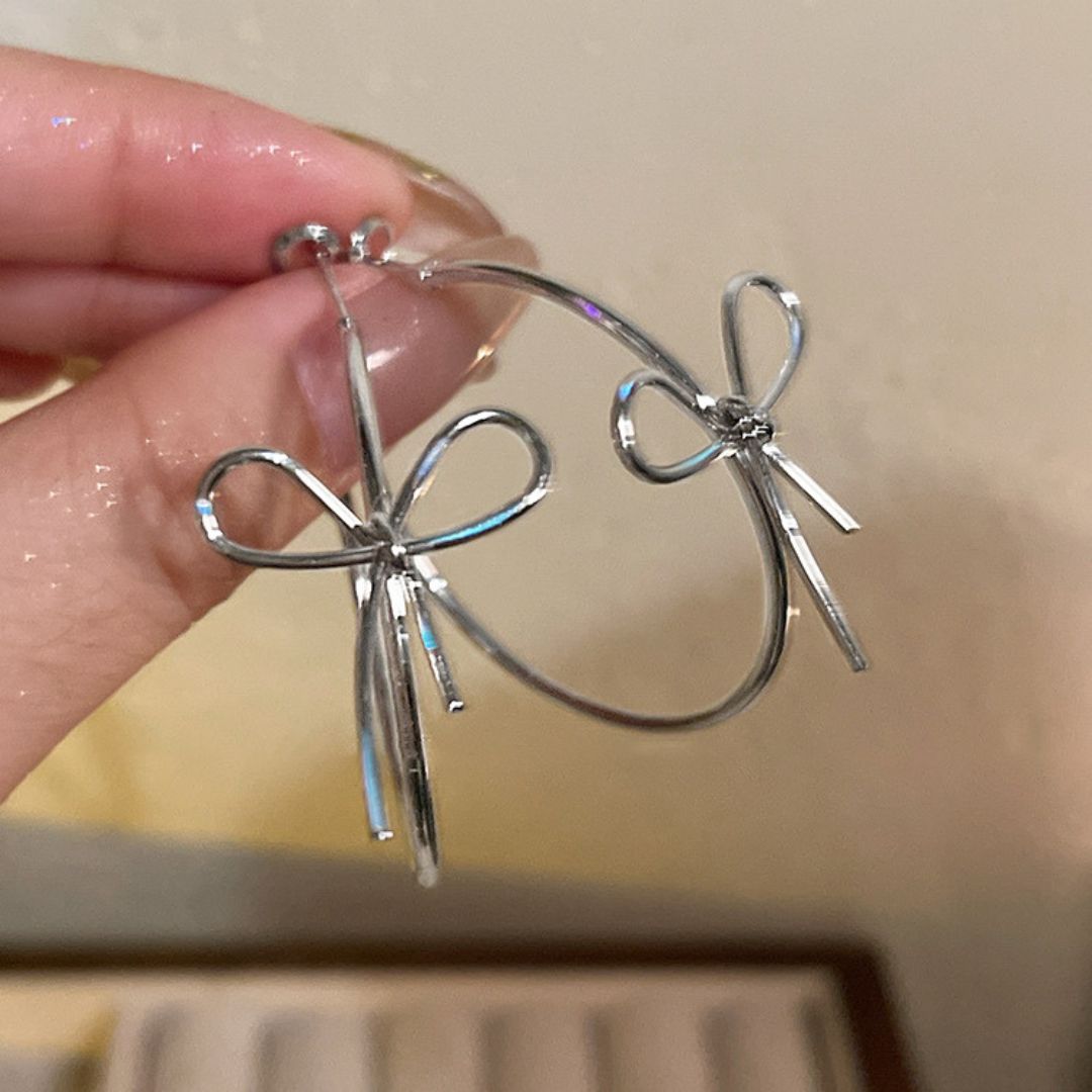 Sleek Silver Bow Earrings