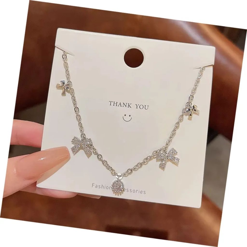 Pixie Bow Charm Necklace