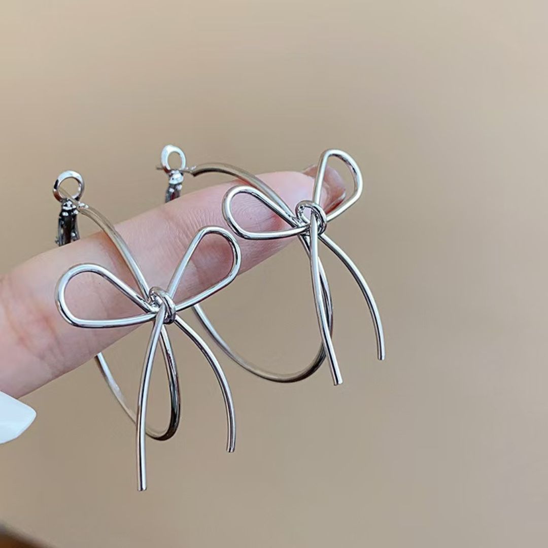 Sleek Silver Bow Earrings