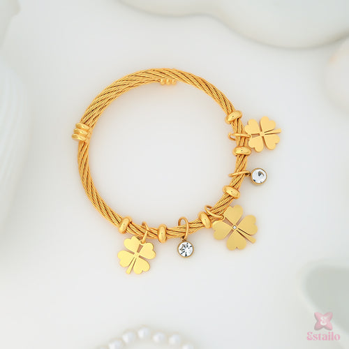 Gilded Charm Statement Bracelet