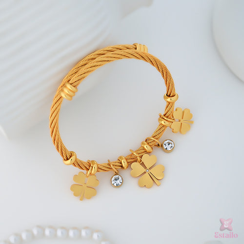 Gilded Charm Statement Bracelet