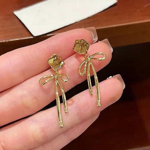 Graceful Gold Drop Bows Earring