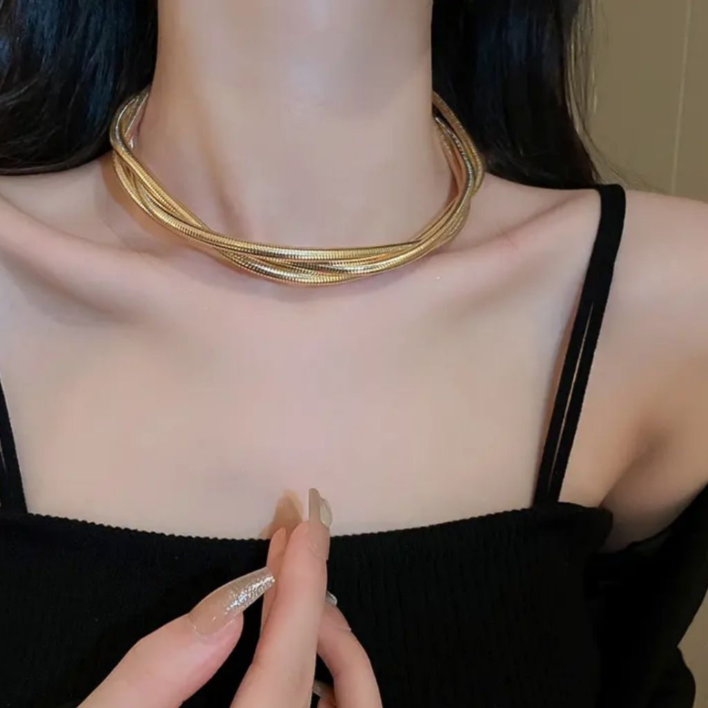 Moody Gold Twirl Necklace