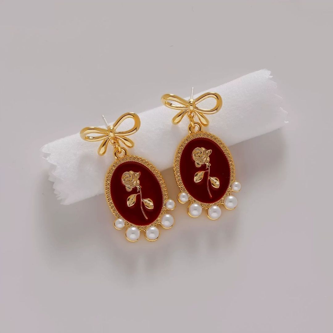Gilded Garnet Cameos Earrings