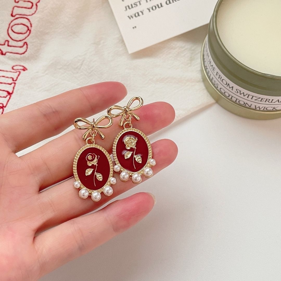 Gilded Garnet Cameos Earrings
