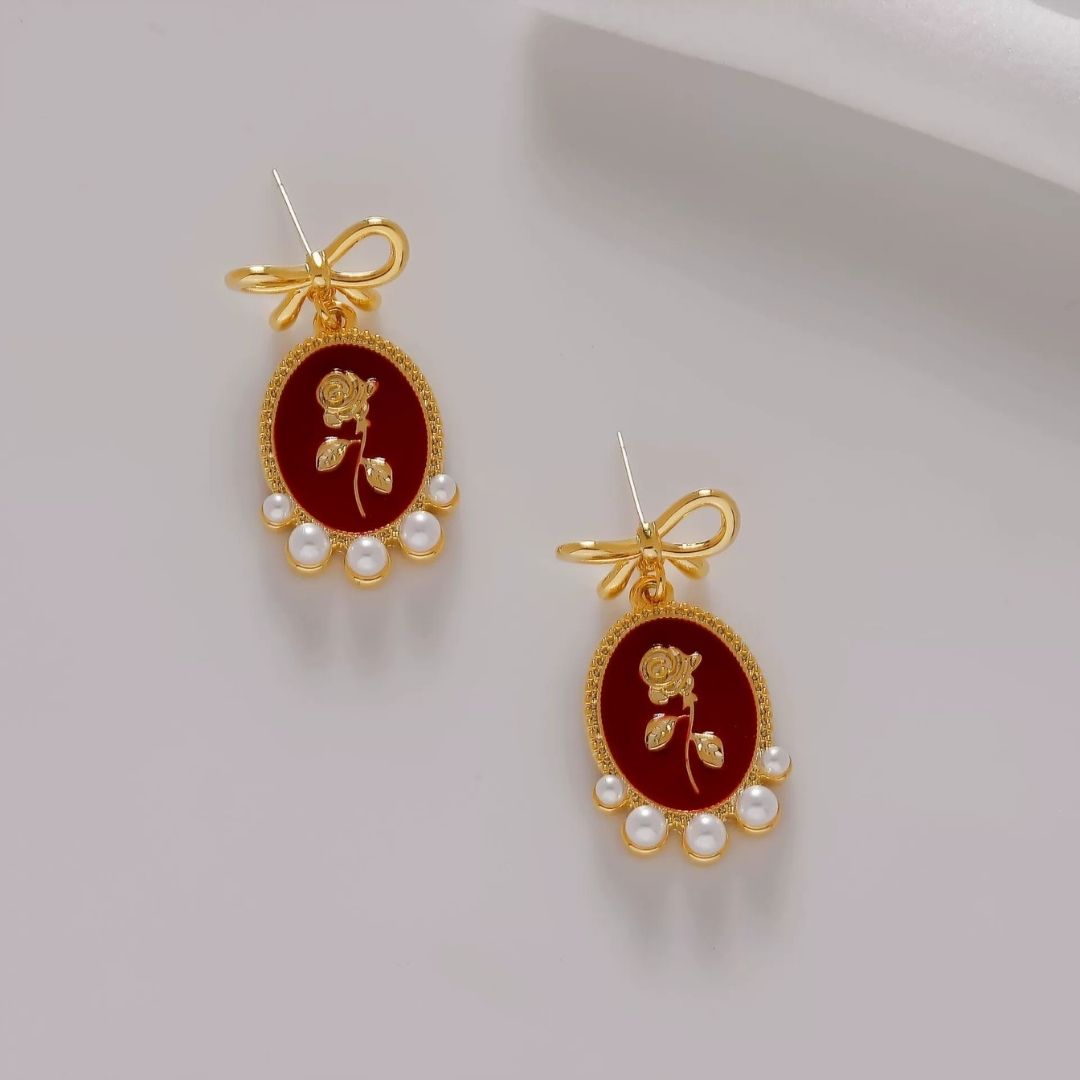 Gilded Garnet Cameos Earrings