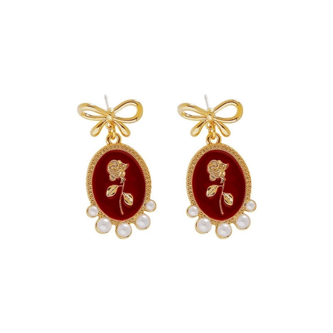 Gilded Garnet Cameos Earrings