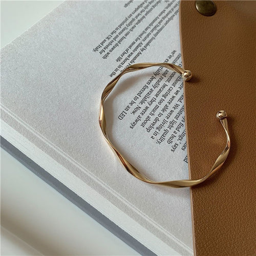 Gilded Twist Wave Bracelet