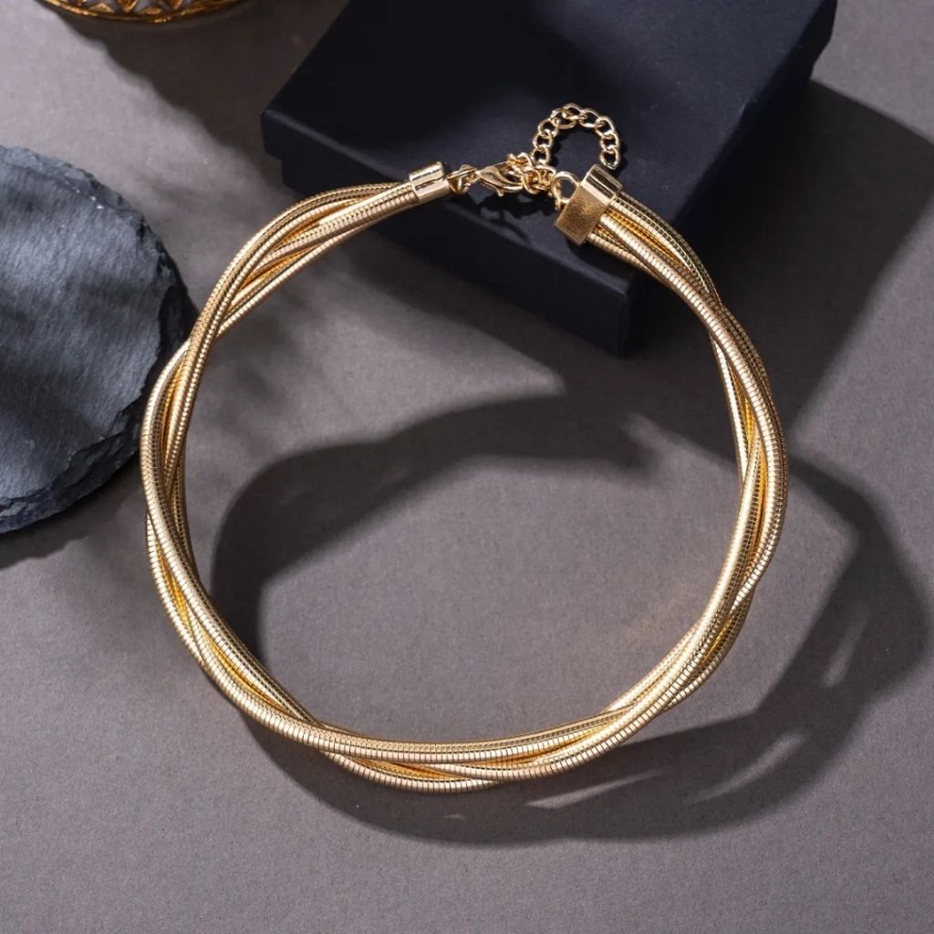 Moody Gold Twirl Necklace