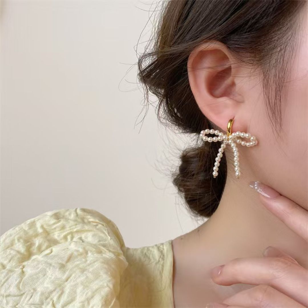 Graceful Bow Pearl Dangles Earrings