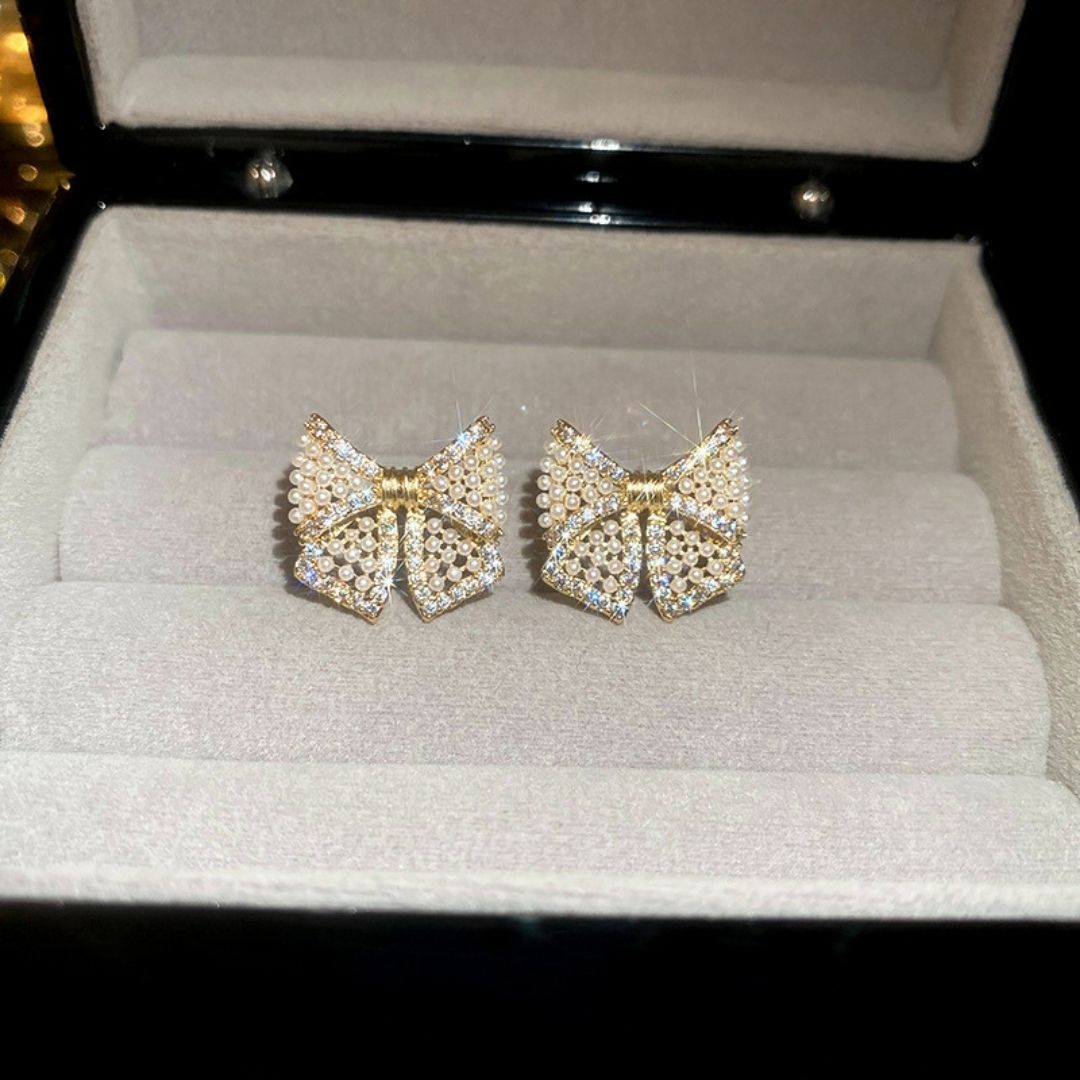 Gilded Pearl Bow Studs Earrings