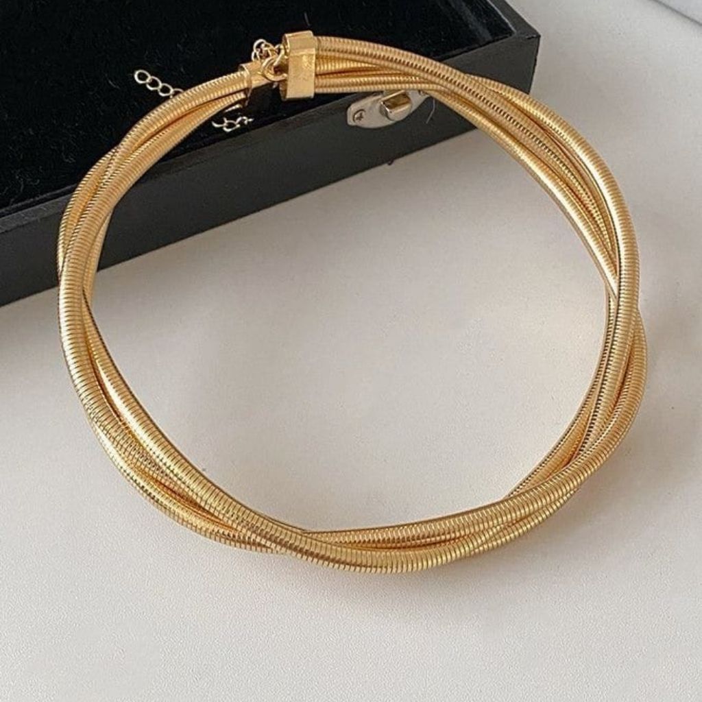 Moody Gold Twirl Necklace