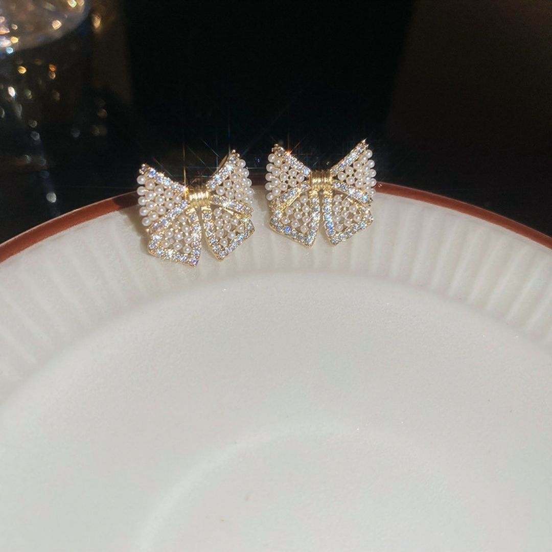 Gilded Pearl Bow Studs Earrings