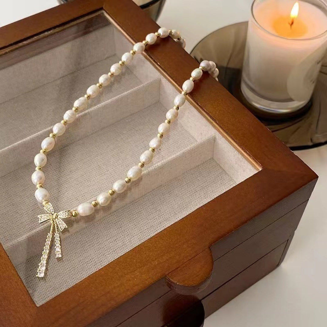 Graceful Pearl & Zircon Bow Necklace