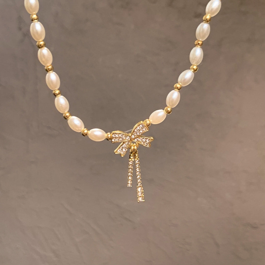 Graceful Pearl & Zircon Bow Necklace