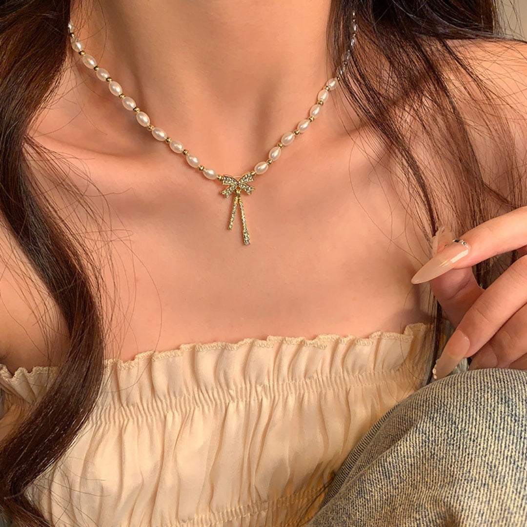 Graceful Pearl & Zircon Bow Necklace