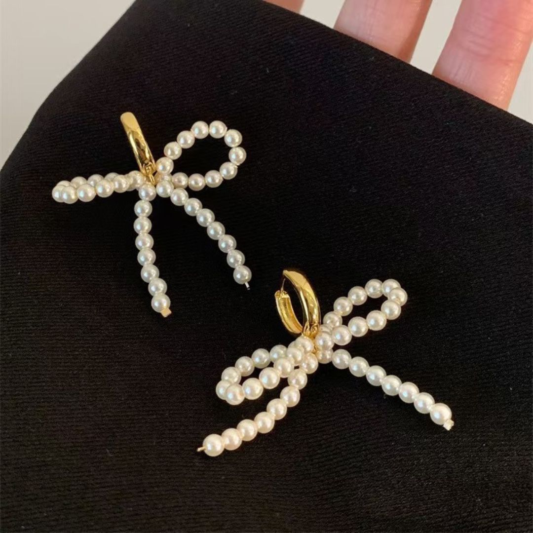 Graceful Bow Pearl Dangles Earrings