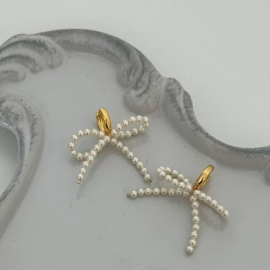 Graceful Bow Pearl Dangles Earrings