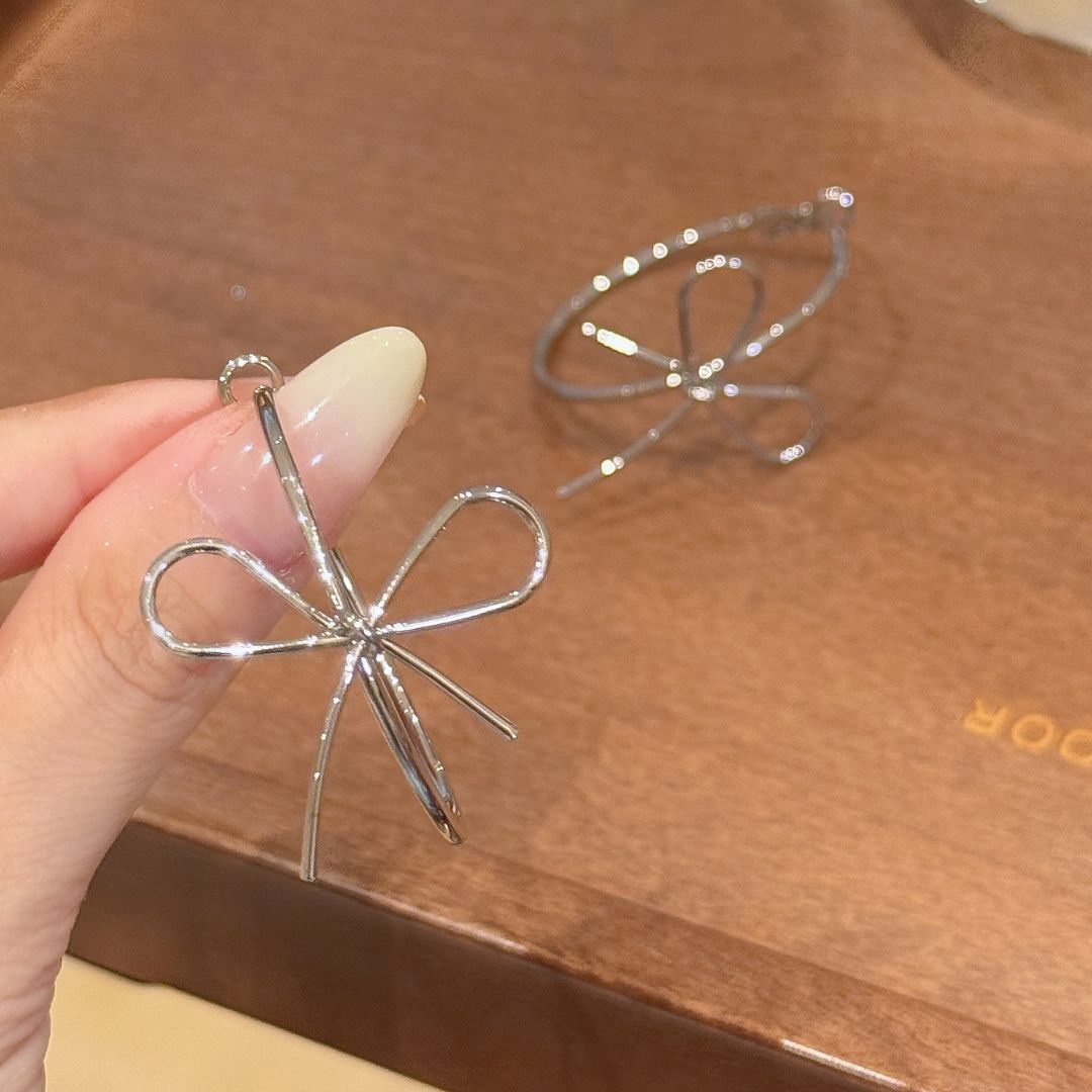 Sleek Silver Bow Earrings