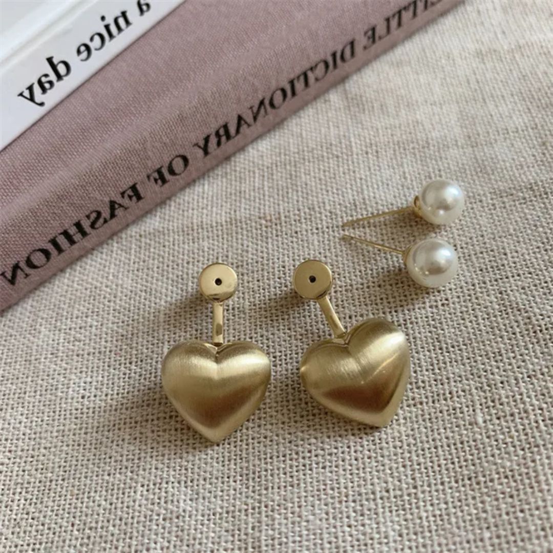 A pearl of golden heart earrings