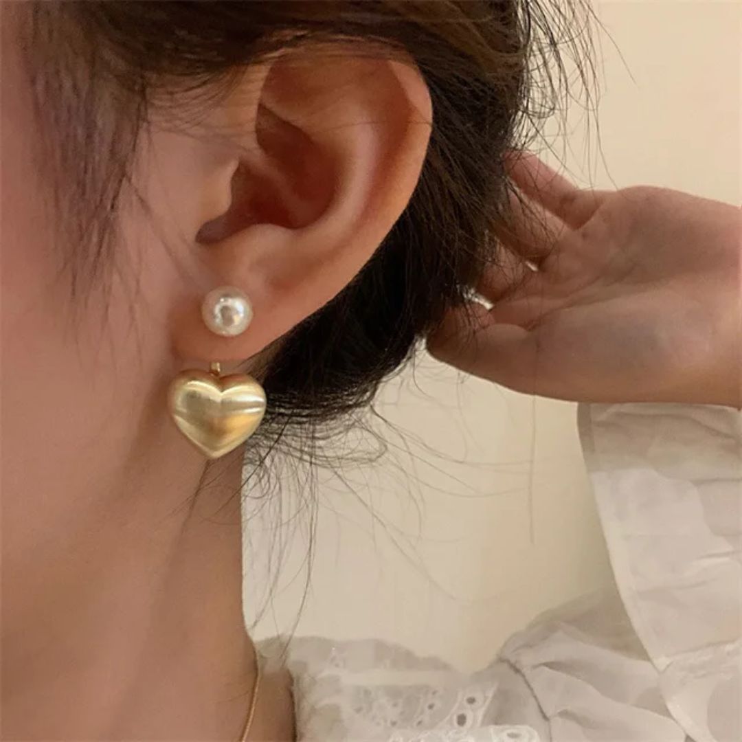 A pearl of golden heart earrings