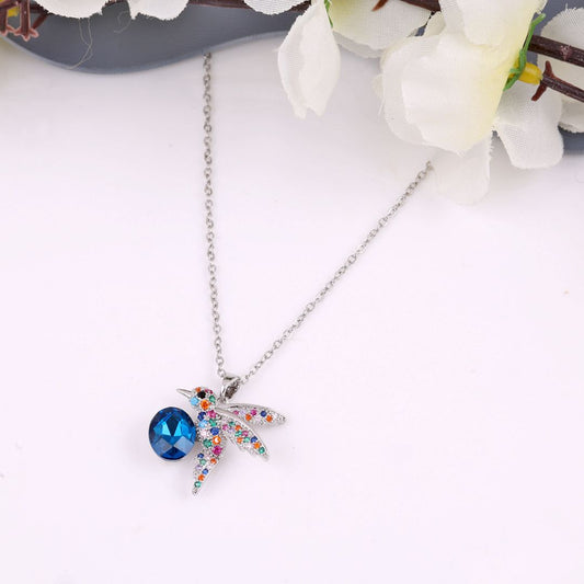 Bird charm necklace