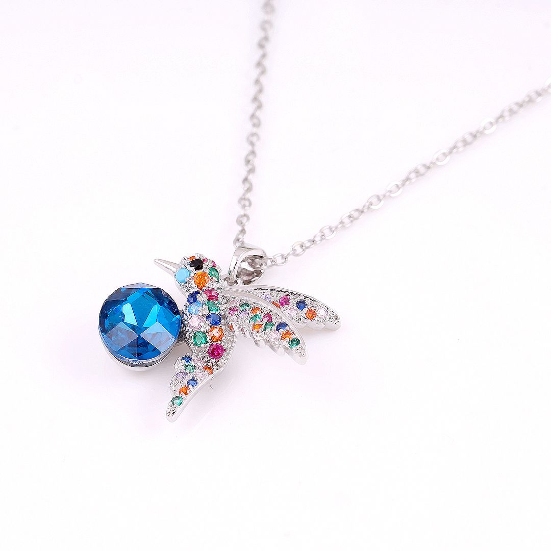 Bird charm necklace