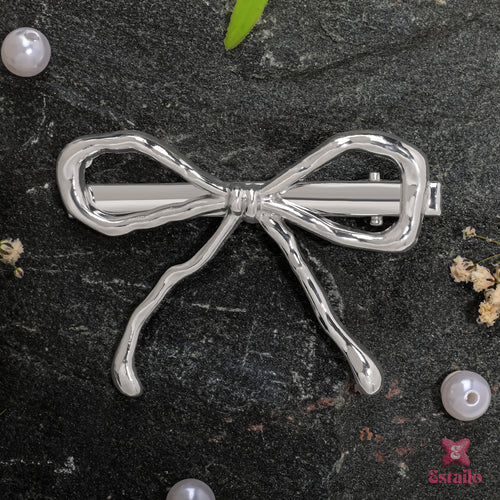 Dainty silver bow clip