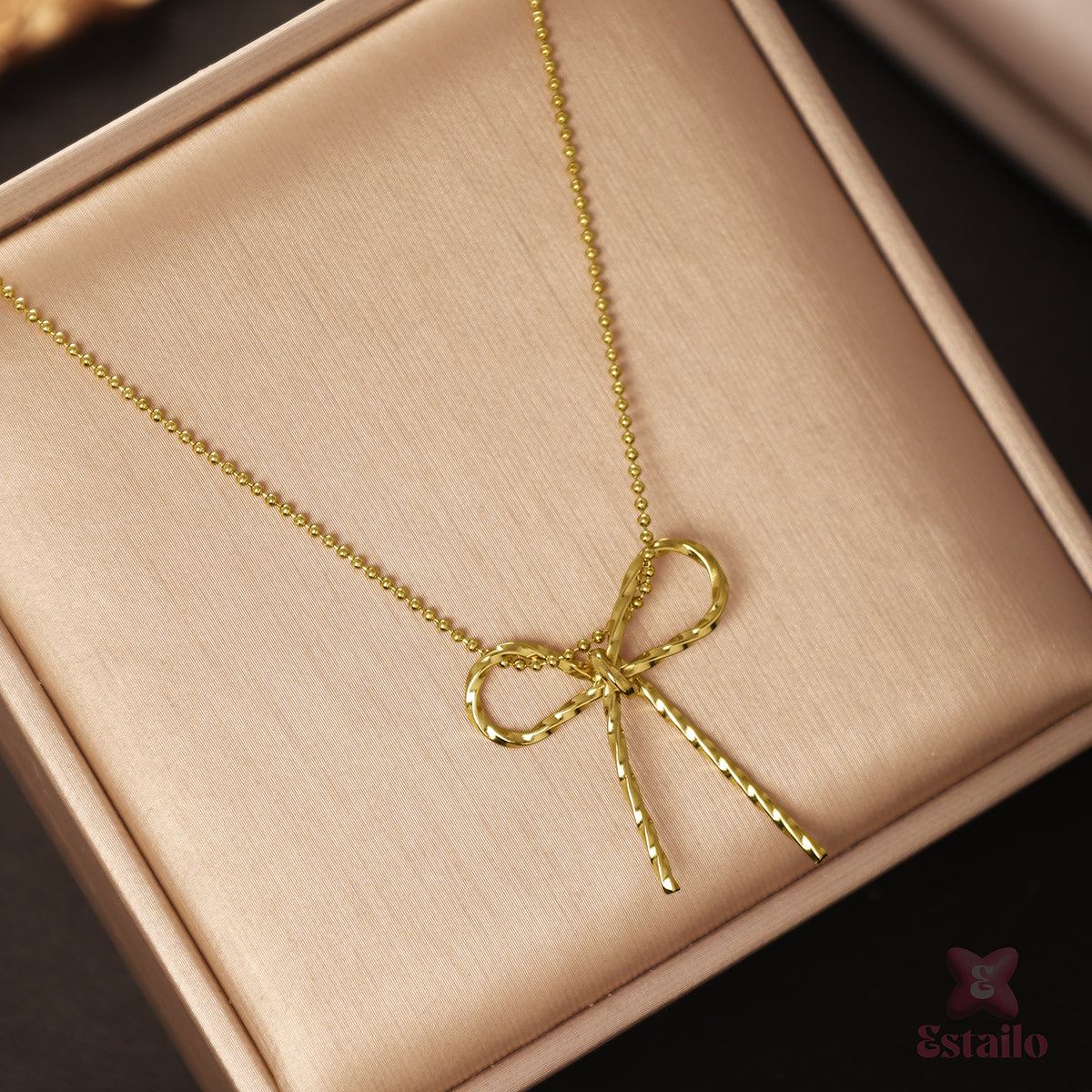 Gleaming Bow Necklace