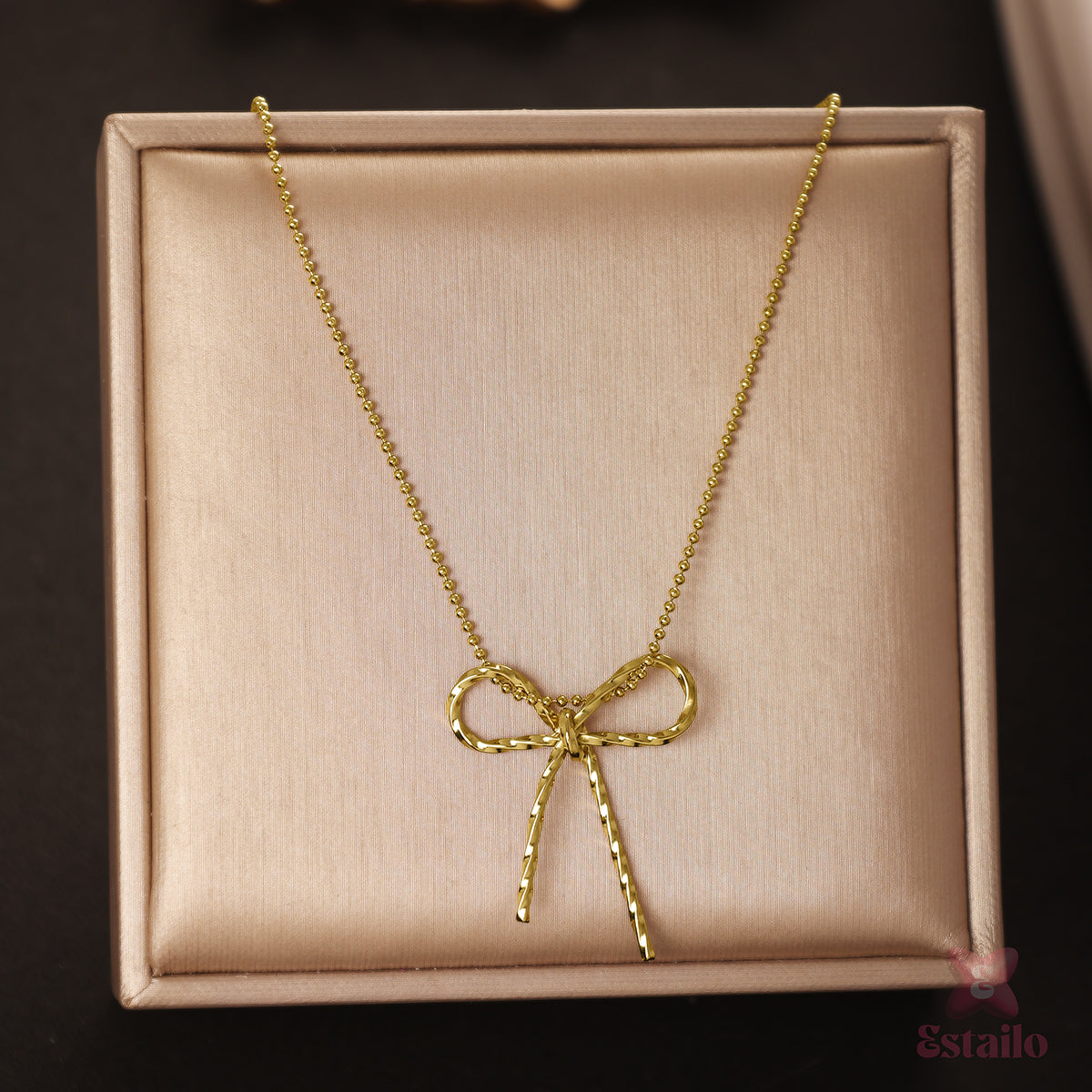 Gleaming Bow Necklace