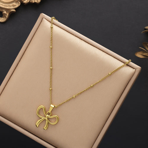 Golden Bow Serenade Neckpiece