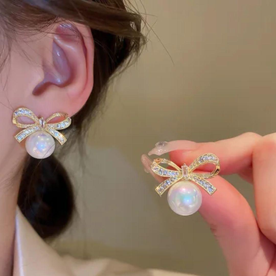 Perky Pearl Bow Stud Earrings