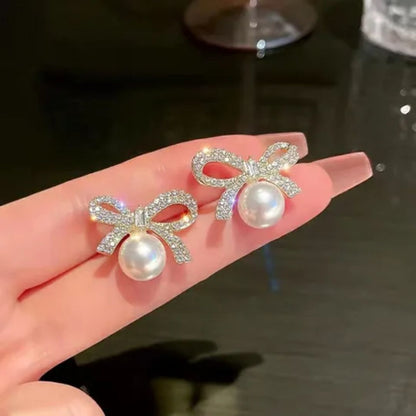 Perky Pearl Bow Stud Earrings