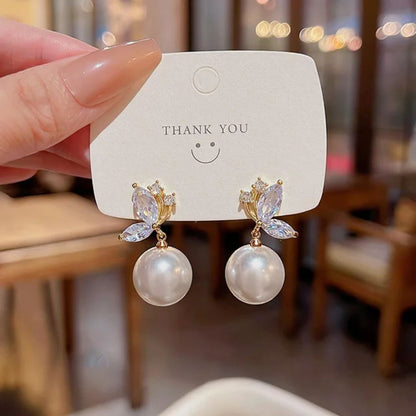 Perky Pearl Drop Earrings