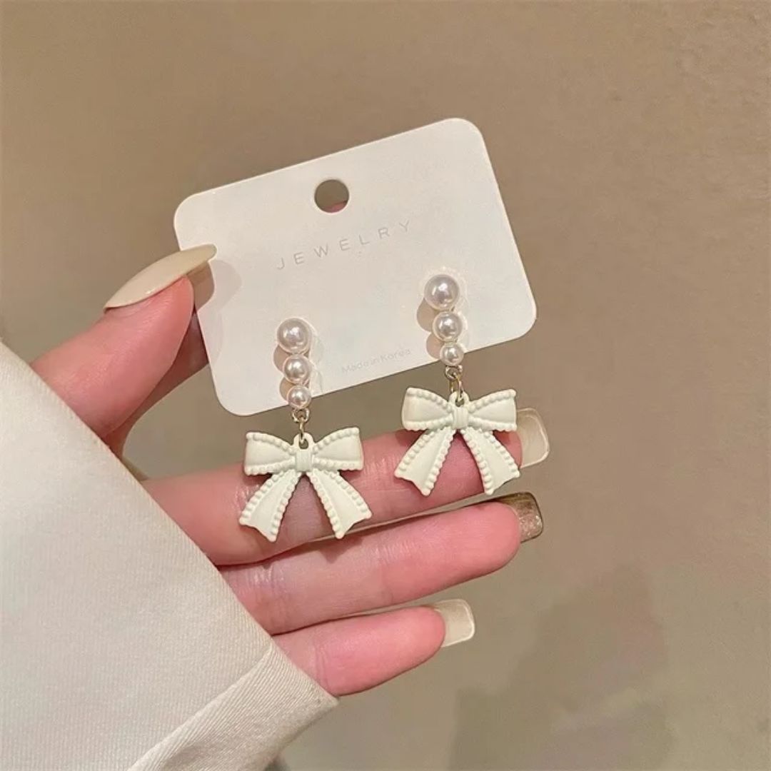 A Pearl Of Wisdom Bow Earrings