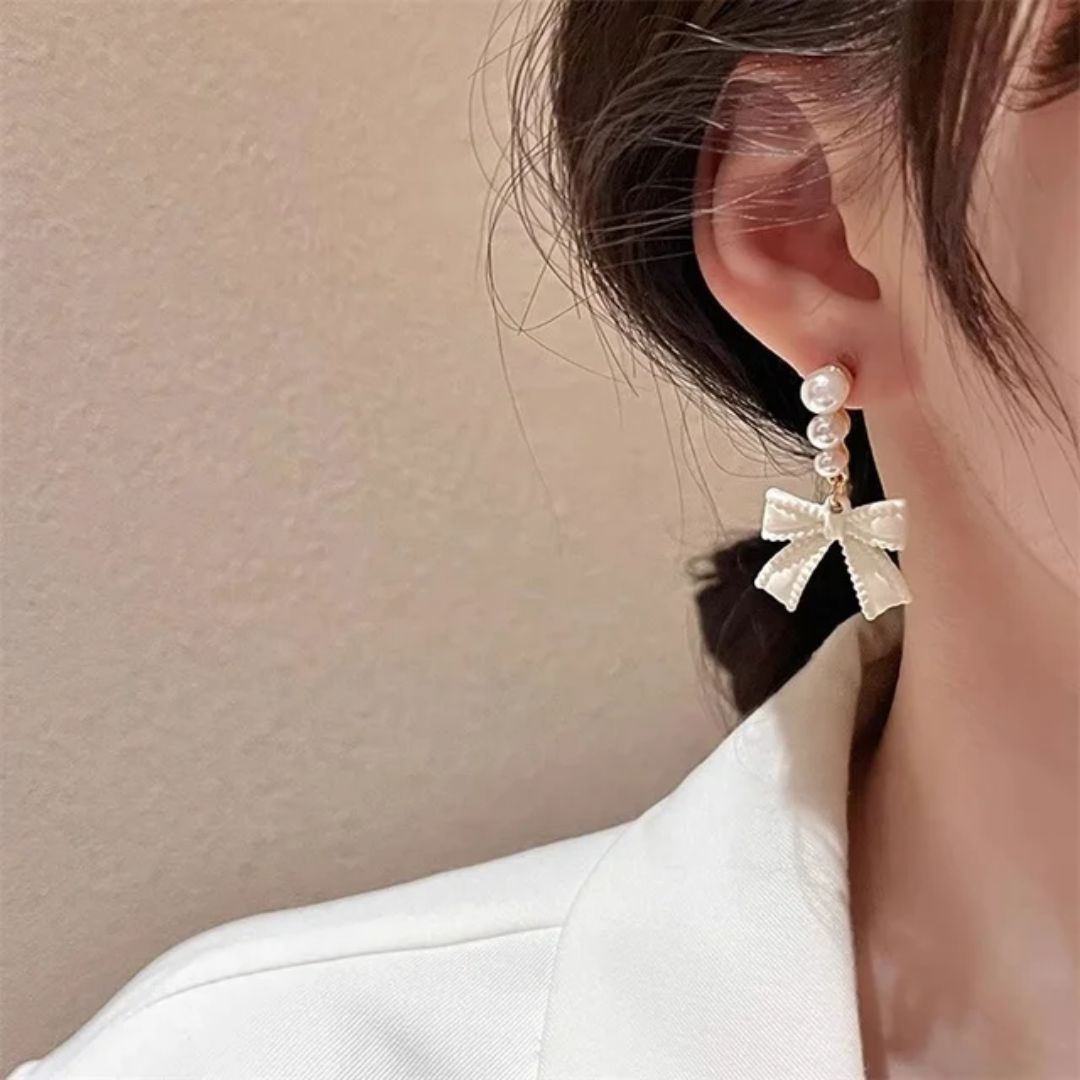 A Pearl Of Wisdom Bow Earrings