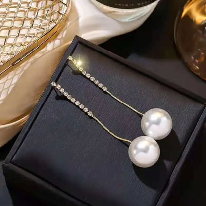 Perky Pearl long Chain Earrings