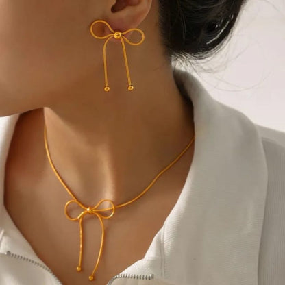 Combo of Bow Earrings and Neckpiece