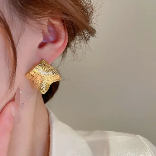 Gilded Wave Studs Earrings