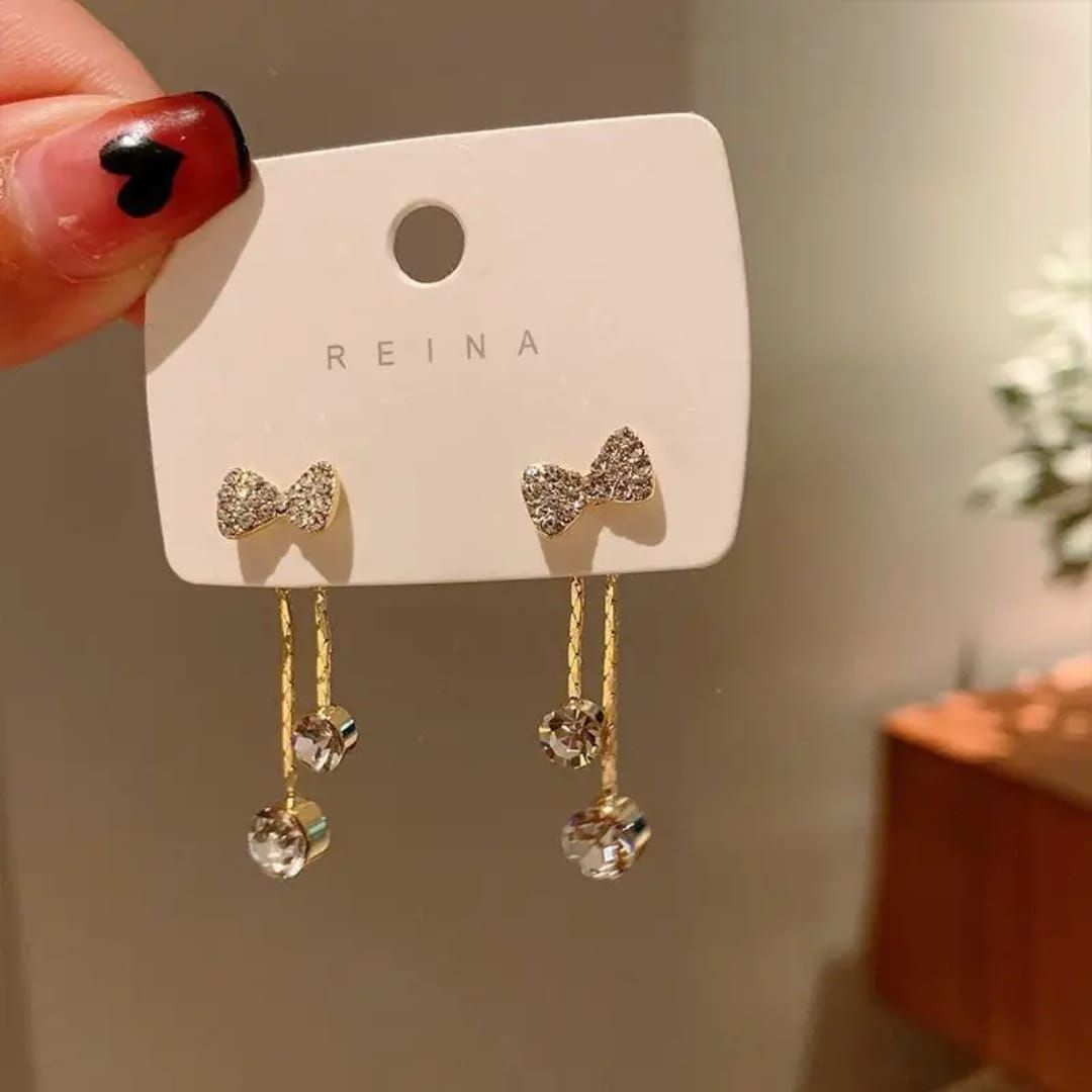 Take A Bow Long Chain Earrings