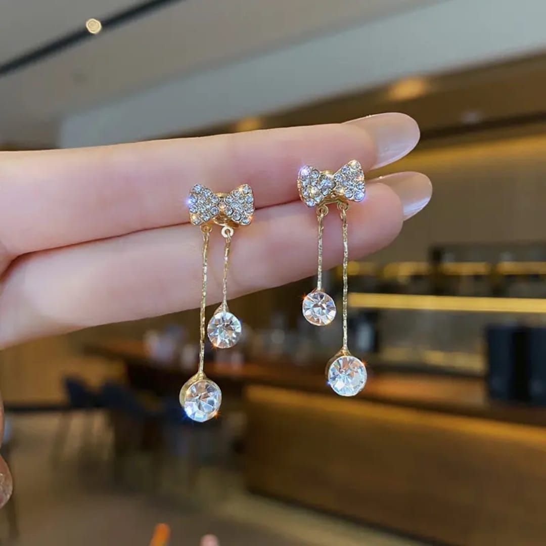 Take A Bow Long Chain Earrings